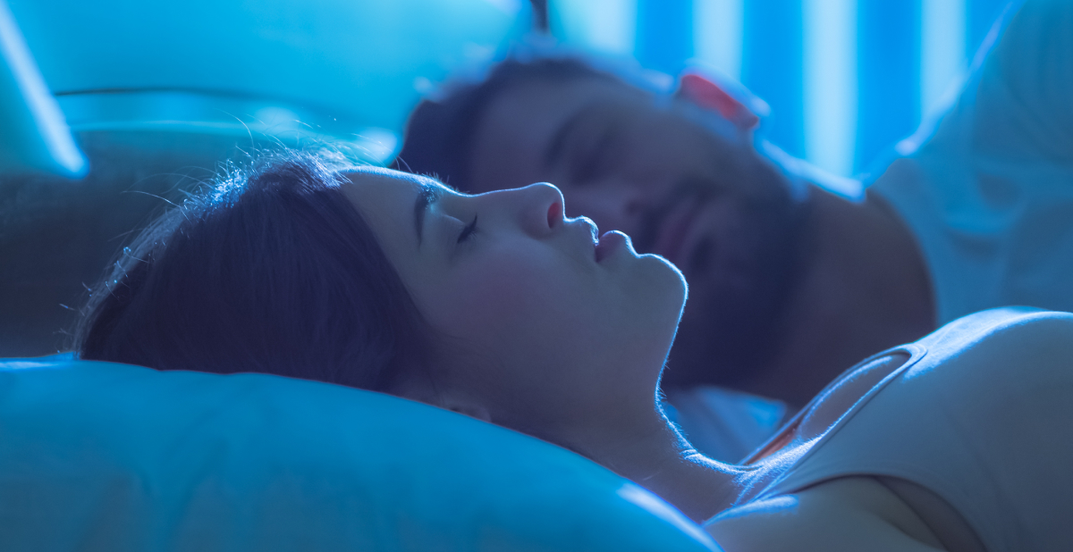 What happens to your skin at night? Couple sleeping